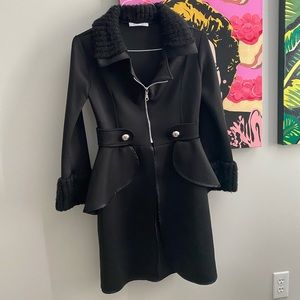 Black Hi-Lo  jacket with zipper and button detail.